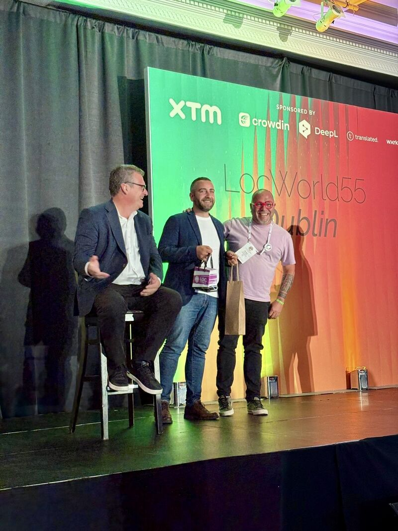Anthony Neal Macri speaking onstage at LocWorld in Dublin