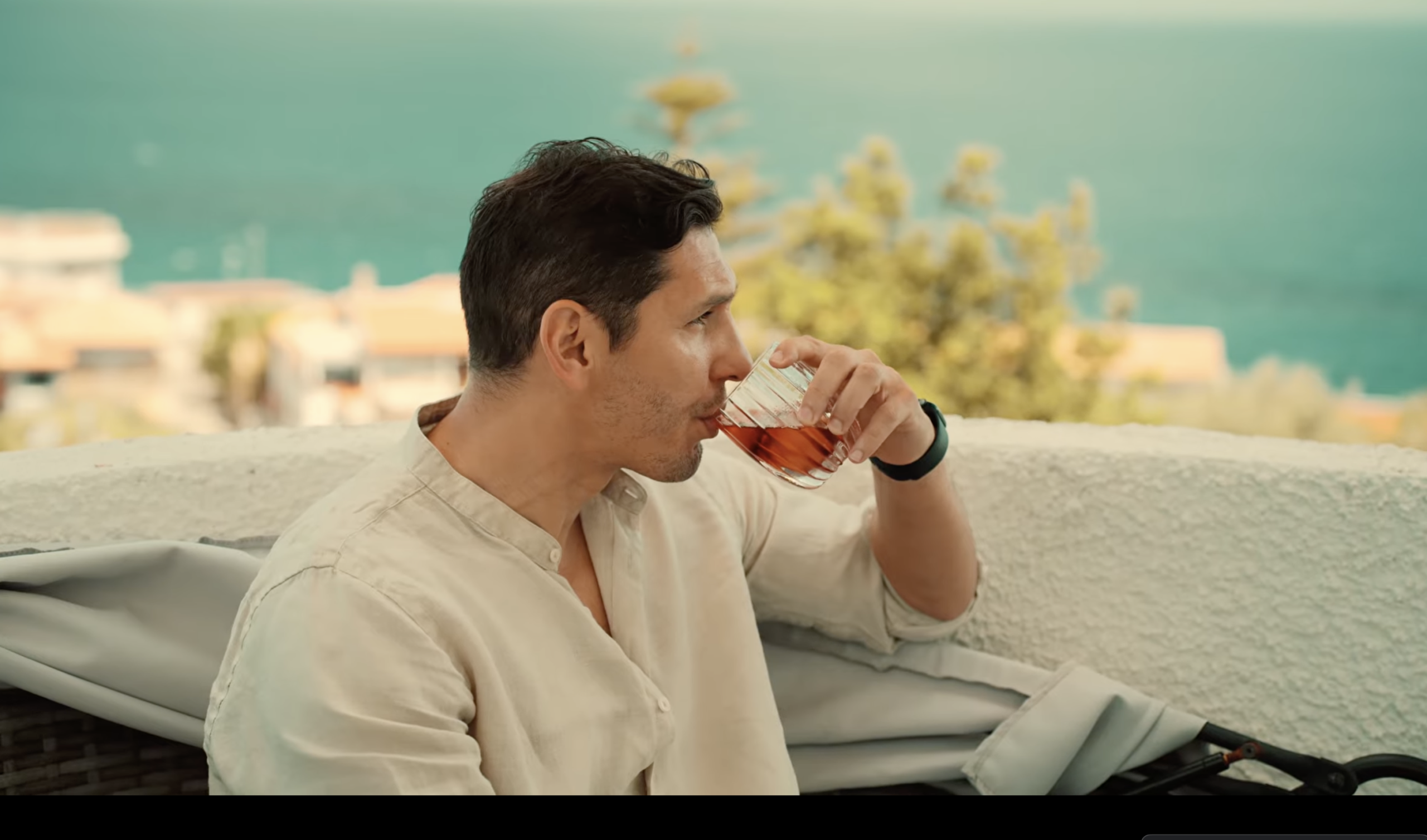 Featured Image Alt Text Anthony Neal Macri on the terrace of a Stalettì villa overlooking the Ionian Sea — behind the scenes of the LanguageCheck.ai global ad campaign shot in Calabria